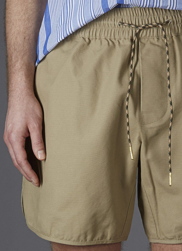 khaki track top